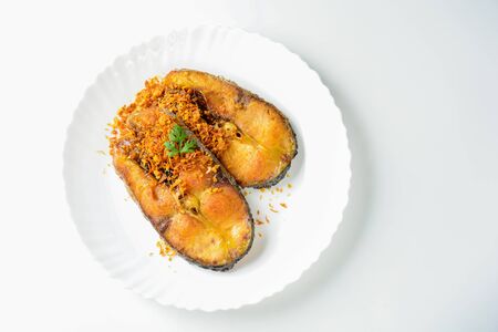 Deep Fried Pangasius fish with Black Pepper Garlic and fish source, quick and easy dish.
の写真素材