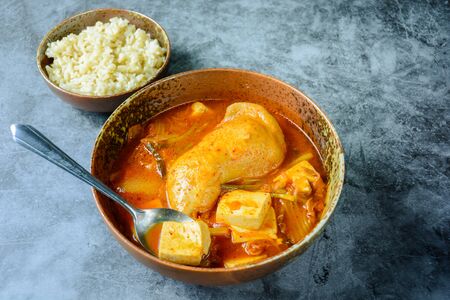 Korean traditional Kimchi soup with chicken and soft tofu
の写真素材
