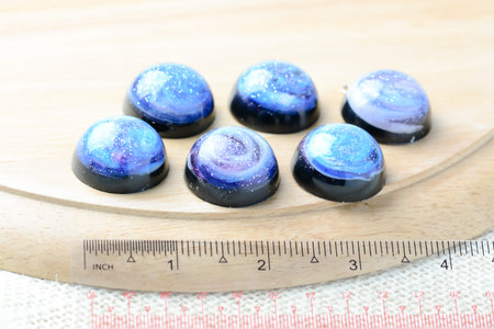 Create galaxy drink coasters using resin, glitter and pigment powders, handmade items. Suitable for...