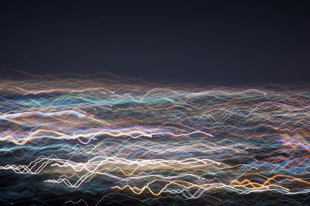 Abstract long exposure, experimental surreal photo, city and vehicle lights at night