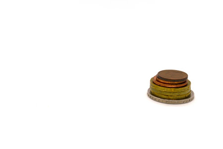 Stack of euro cents coins. Stack of euro cent coins on a white background.の写真素材
