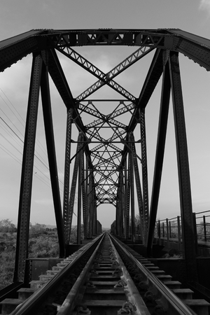 Truss bridge for railway.It cross over the river.の写真素材