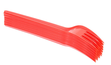 Plastic red tableware on white