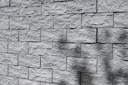 Grey ceramic block wall. Blocks of expanded clay concrete in a section.