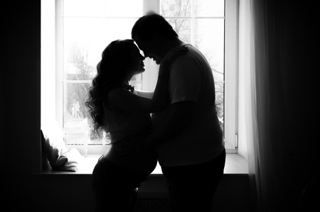 Pregnant woman with husbandの写真素材