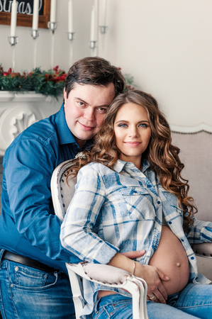 Pregnant woman with husbandの写真素材