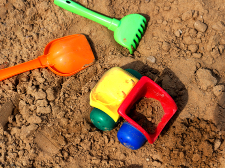 children's multicolored toys for playing in the sandの写真素材