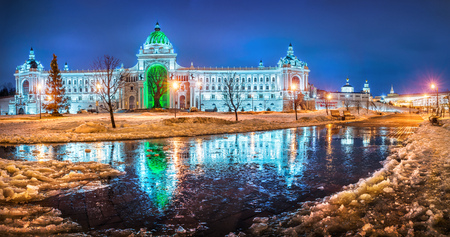 The Farmers' Palace near the Kazan Kremlin and reflection in an icy winter puddleのeditorial素材