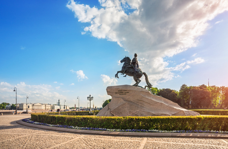 Monument to Peter the Great on the Senate Square in St. Petersburg on a summer sunny day and a white cloud on a blue skyのeditorial素材