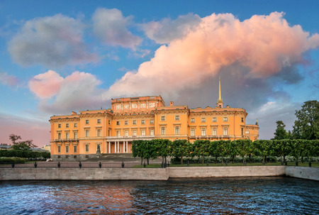 Mikhailovsky (Engineers) Castle in St. Petersburg near Fontanka in the rays of the setting sun and a large pink cloudのeditorial素材