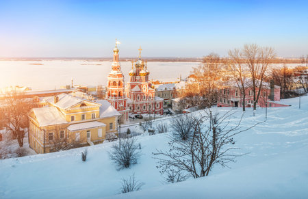 Christmas Church in Nizhny Novgorod in the rays of sunset on the high bank of the Volga on a sunny...