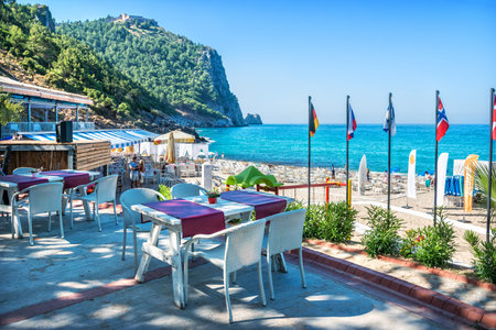 Turkey. Cleopatra's beach in Alanya and an empty cafe table and the Mediterranean Seaのeditorial素材