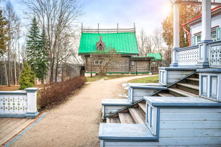 Main house with porch and kitchen building in Abramtsevo on a spring sunny dayのeditorial素材