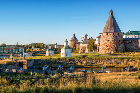 Towers of the Solovetsky Monastery and White Chapels on the Solovetsky Island in the rays of the setting sunのeditorial素材