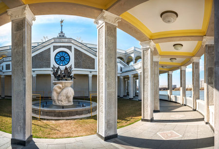 The building of the new River Station from the inside with arches and a sculpture of a fountain in...