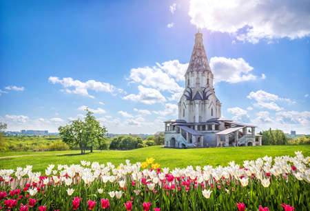 Ascension Church and tulips in Kolomenskoye in Moscow on a summer sunny dayの写真素材