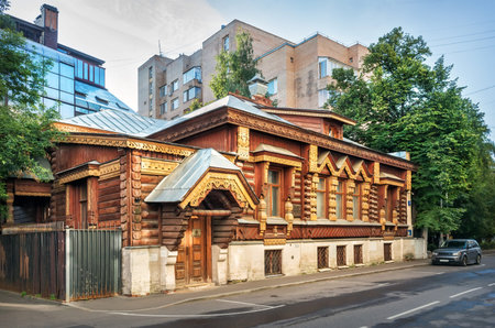 Wooden "Porokhovshchikov's House" in Russian style in a lane on the Arbat in Moscowの写真素材