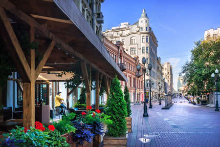 A sculpture of Elvis Presley at the veranda of a cafe on the Arbat in Moscow on a summer morningのeditorial素材