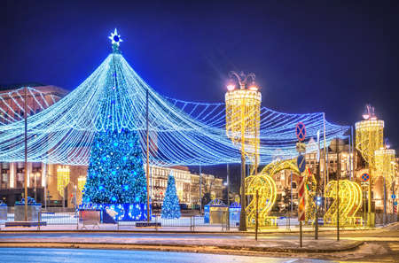 Christmas tree on Lubyanskaya Square in Moscow in the light of night lightsのeditorial素材