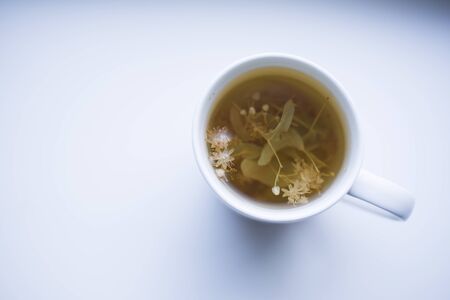 herbal cup of tea on the tableの写真素材