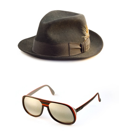 Retro sunglasses, Classic black  felt trilby fedora hat isolated on a white background の写真素材