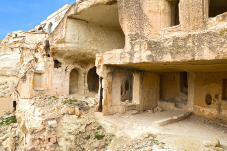 Ruins cave town in Cavusin, Cappadocia, Turkeyのeditorial素材