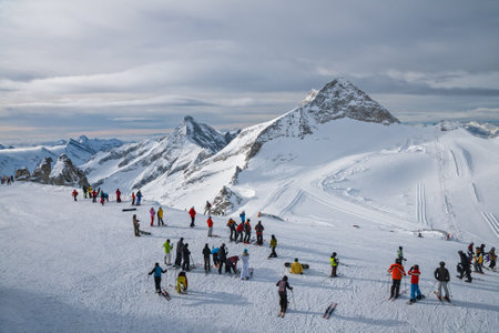 Winter mountain landscape ski resort Zillertal Hintertuxer Glacier, Tirol, Austria. Crowd of people skiers and snowboarders at upper station of Hintertux liftの写真素材