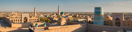 Panoramic view of the ancient fortress Ichan Kala from the observation deck at sunset. Khiva, Uzbekistanの写真素材