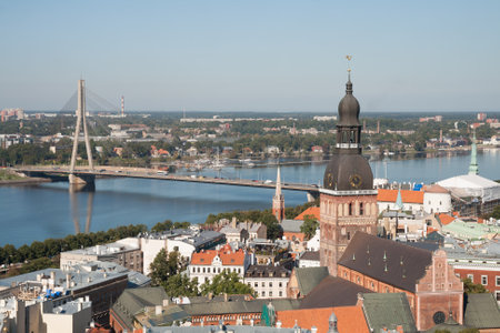 Aerial view of Dome Cathedral and bridge across the Daugava River, Riga, Latviaの写真素材