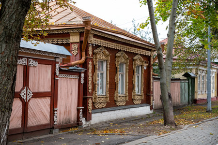 Old Kolomna, street with wooden houses decorated with carved window frames. Moscow region, Russia.の写真素材