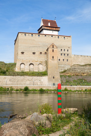 Border between Russia and Estonia on the River Narva. Focus at the border postの写真素材