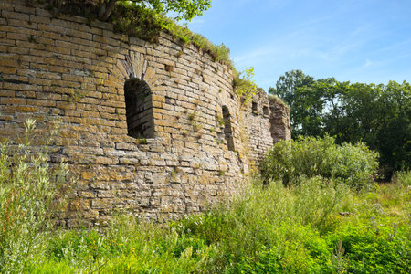 Ivangorod Fortress Ruins. The round corner tower with loopholes.の写真素材
