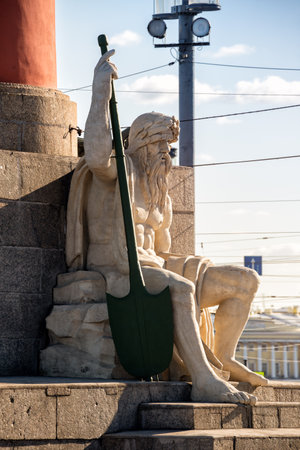 Sculpture allegory of the Volkhov River at the foot of the Rostral Column on Vasilyevsky Island, St. Petersburg, Russiaの写真素材