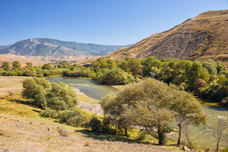Picturesque landscape of the Kura River in Samtskhe-Javakheti, Georgia. Sunny early autumn day
