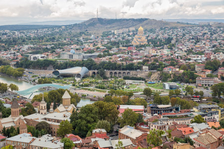 View from Mtatsminda Mountain on Rike Park, Trinity Cathedral and other sights of Tbilisi, Georgia