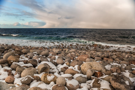 Rocky shore of the Barents Sea. The Dragon's Eggs rocky beach in Teriberka, Murmansk Oblastの写真素材