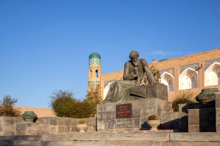Khiva, Uzbekistan - October, 2016: Monument to outstanding mathematician of Middle Ages Muhammad ibn Musa al-Khwarizmi installed at Western gate of Itchan-Kala in 1983 to 1200th anniversary of scientistのeditorial素材