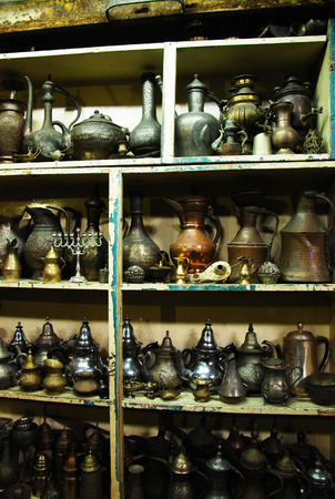 Vintage pitchers and lamps at a flea marketの写真素材