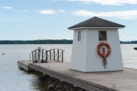 house on the jetty at the lake horizontalの写真素材