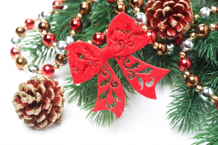 composition with Christmas ornaments on the branches of spruce, on whiteの写真素材