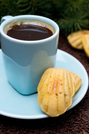 cup of coffee and cookies madeleines, close-up, verticalの写真素材