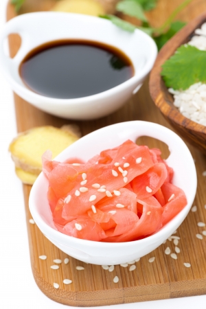 Asian food ingredients (ginger, soy sauce, rice), on white, top viewの写真素材