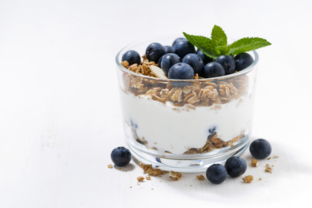 dessert with fresh blueberries, granola and cream, closeupの写真素材