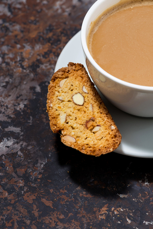 cup of coffee with milk and Italian cookies cantucci, top viewの写真素材