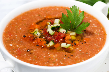 cold tomato soup in a bowl, closeupの写真素材