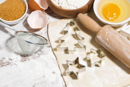 Ingredients for baking Christmas cookies on table.の写真素材