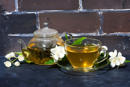 fragrant jasmine tea on a dark background, horizontalの写真素材