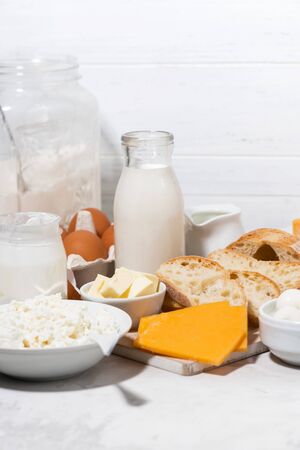 Assortment of fresh farm dairy products, vertical closeupの写真素材