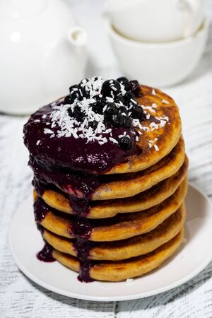 Stack of corn pancakes with blueberry jam for breakfast, closeupの写真素材