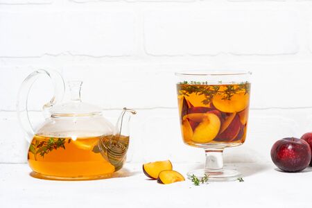 flavored black tea with plum and thyme, closeupの写真素材